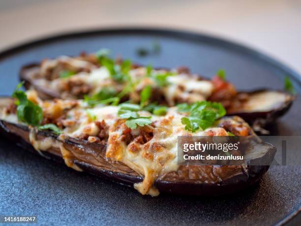 traditional turkish food stuffed eggplant, meat, tomato and spices, karniyarik - eggplant imagens e fotografias de stock