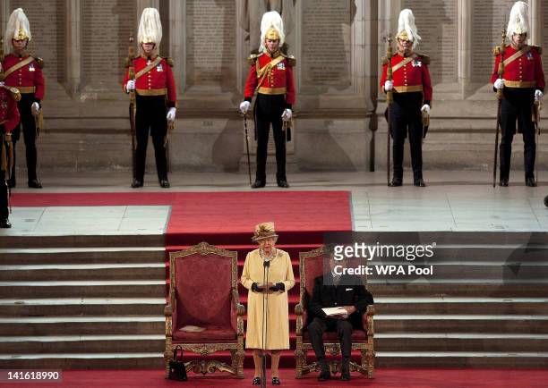 Prince Phillip, Duke of Edinburgh looks on as Queen Elizabeth II adresses both Houses of Parliament in Westminster Hall on March 20, 2012 in London,...