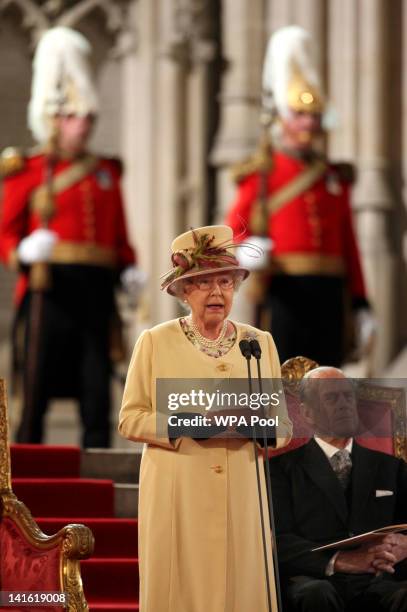 Queen Elizabeth II addresses both Houses of Parliament as Prince Philip, Duke of Edinburgh looks on, in Westminster Hall on March 20, 2012 in London,...