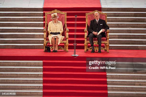 Queen Elizabeth II sits with Prince Philip, Duke of Edinburgh at Westminster Hall on March 20, 2012 in London, England. Following the address to...