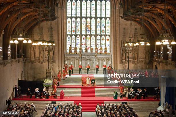 Queen Elizabeth II addresses both Houses of Parliament as Prince Philip, Duke of Edinburgh looks on, in Westminster Hall on March 20, 2012 in London,...