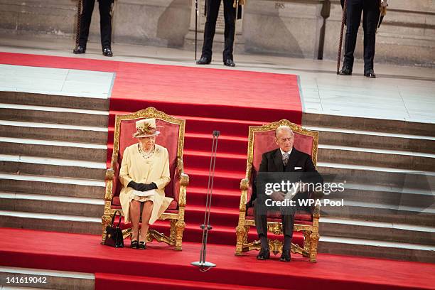 Queen Elizabeth II sits with Prince Philip, Duke of Edinburgh at Westminster Hall on March 20, 2012 in London, England. Following the address to...