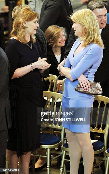 Sarah Brown , wife of former British prime minister Gordon Brown, talks with Sally Bercow , wife of the speaker of the House of Commons John Bercow,...