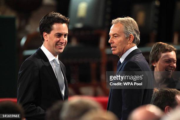 Leader of the Labour party Ed Miliband and former British Prime Minister Tony Blair speak before Queen Elizabeth II and the Prince Philip, Duke of...