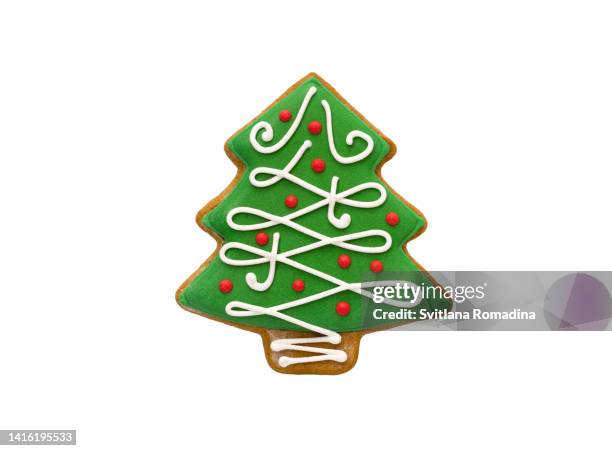 gingerbread cookie, decorated as christmas tree - gingerbread cookies stock-fotos und bilder