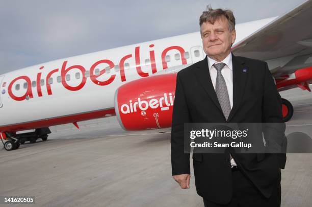 Air Berlin CEO Hartmut Mehdorn stand next to an Air Berlin passenger plane after he signed a document confirming Air Berlin's acceptance into the...