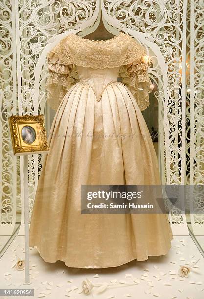 Queen Victoria's wedding dress on display in the 'Love Room' in Kensington Palace in London, England. Kensington Palace is due to reopen to the...