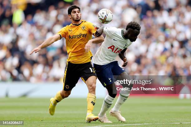 Goncalo Guedes of Wolverhampton Wanderers battles for possession against Davinson Sanchez of Tottenham Hotsput during the Premier League match...