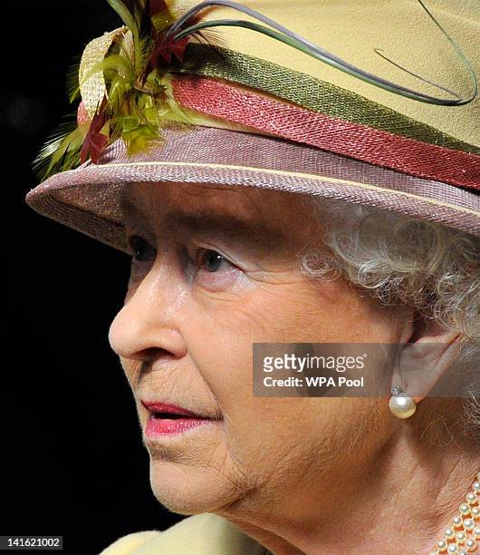 Queen Elizabeth II arrives to address both Houses of Parliament at Westminster Hall on March 20, 2012 in London, England. Following the address to...