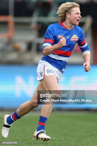 Cody Weightman of the Bulldogs celebrates kicking a goal during the round 23 AFL match between the Hawthorn Hawks and the Western Bulldogs at...