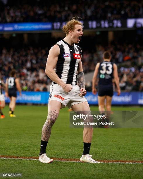 Beau McCreery of the Magpies celebrates kicking a goal during the round 23 AFL match between the Carlton Blues and the Collingwood Magpies at...