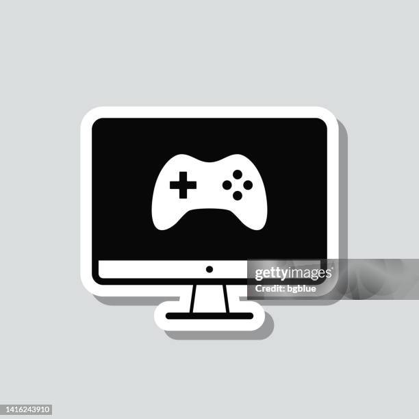 video game on desktop computer. icon sticker on gray background - gaming controller white stock illustrations
