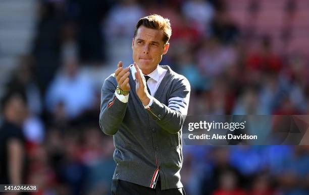 Scott Parker, Manager of AFC Bournemouth acknowledges the fans before the Premier League match between AFC Bournemouth and Arsenal FC at Vitality...