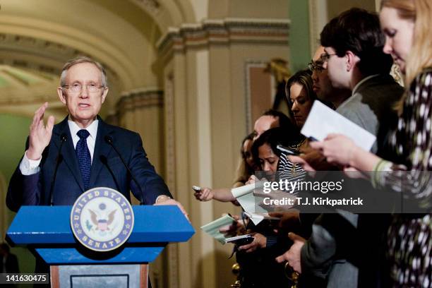 Senate Majority Leader Harry Reid speaks to the media after a weekly policy meeting at the Capitol on March 20, 2012 in Washington, DC. The stage is...