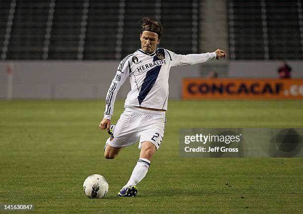 David Beckham of the Los Angeles Galaxy attacks against Toronto FC during a CONCACAF Champions League game at The Home Depot Center on March 14, 2012...