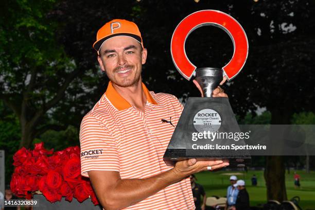 Rickie Fowler holds the trophy for winning the 2023 Rocket Mortgage Classic at Detroit Golf Club on July 2, 2023 in Detroit, Michigan.