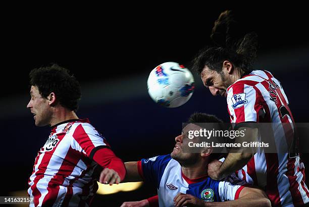 Scott Dann of Blackburn Rovers battles with Sotirios Kyrgiakos of Sunderland during the Barclays Premier League match between Blackburn Rovers and...