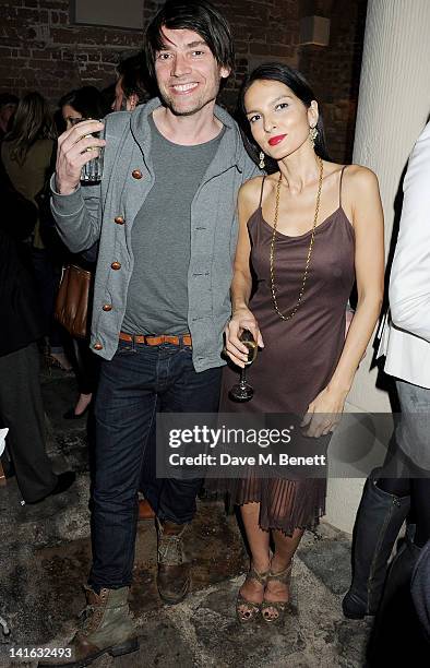 Alex James and Yasmin Mills attend a private dinner celebrating 'Alex James Presents' line of cheeses at Aubaine Dover Street on March 20, 2012 in...