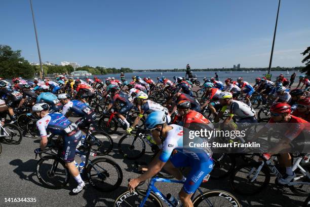 Stan Van Tricht of Belgium and Team Quick-Step - Alpha Vinyl, Jan Maas of Netherlands and Team BikeExchange - Jayco and a general view of the peloton...