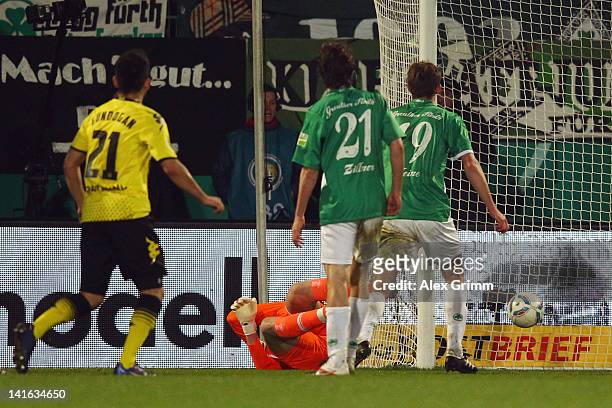 Ilkay Guendogan of Dortmund scores his team's first goal during the DFB Cup semi final match between SpVgg Greuther Fuerth and Borussia Dortmund at...