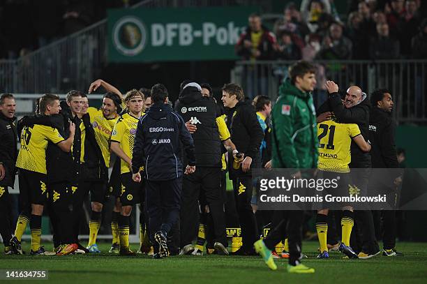 The team of Dortmund celebrates after the DFB Cup semi final match between SpVgg Greuther Fuerth and Borussia Dortmund at Trolli-Arena on March 20,...