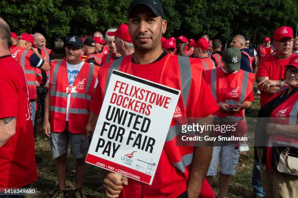Dockers protest near the main gate of Felixstowe Port as an eight day strike, called by the UNITE trade union begins over payon August 21, 2022 in...