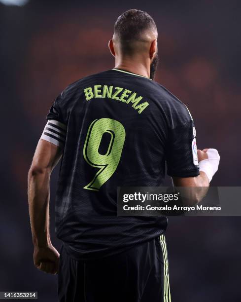 Karim Benzema of Real Madrid CF celebrates scoring their opening goal from a penalty shot during the LaLiga Santander match between RC Celta de Vigo...