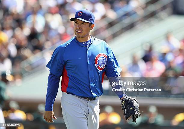 Starting pitcher Rodrigo Lopez of the Chicago Cubs walks off the mound after pitching against the Oakland Athletics during the spring training game...