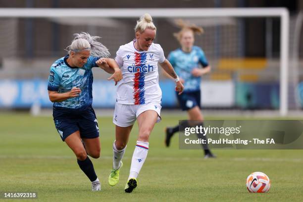 Lily Agg of London City Lionesses battles for possession with Chloe Peplow of Crystal Palace during the Barclays FA Women's Championship match...