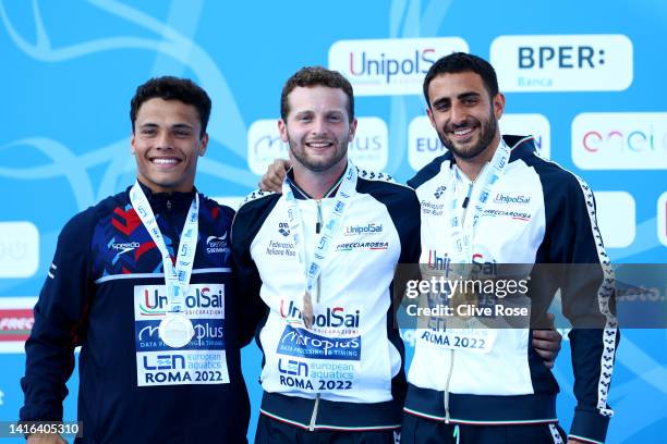 Jordan Houlden of Great Britain, Lorenzo Marsaglia of Italy and Giovanni Tocci of Italy receive their medals on the podium after the Men's 3m...