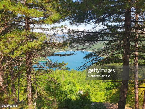 elevated view of lake scanno in central italy - abruzzo stock pictures, royalty-free photos & images