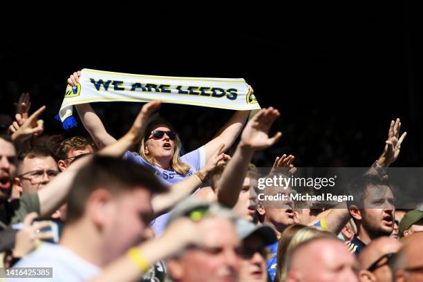 General view as a fan of Leeds United holds a scarf up as they react prior to kick off of the Premier League match between Leeds United and Chelsea...