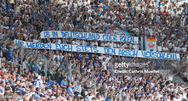 Supporters of FC Hansa Rostock holding up a sign during the Second Bundesliga match between F.C. Hansa Rostock and FC St. Pauli at Ostseestadion on...