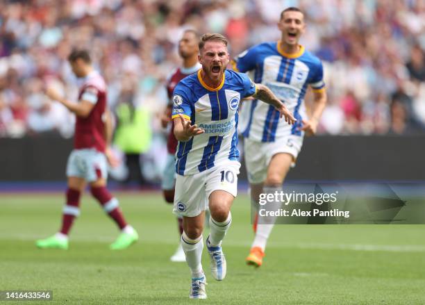 Alexis Mac Allister of Brighton & Hove Albion celebrates after scoring their team's first goal from the penalty spo during the Premier League match...