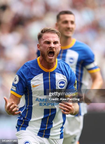 Alexis Mac Allister of Brighton & Hove Albion celebrates after scoring their team's first goal from the penalty spot during the Premier League match...