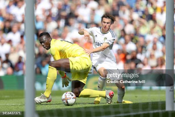 Brenden Aaronson of Leeds United beats Edouard Mendy of Chelsea to score their side's first goal of the game during the Premier League match between...