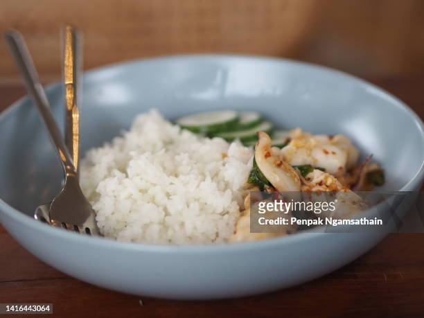 squid with chilli paste - thai food stock-fotos und bilder