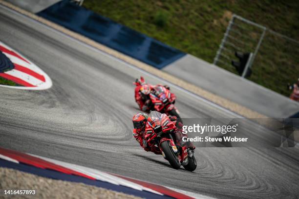 Francesco Bagnaia of Italy and Ducati Lenovo Team rides in front of Jack Miller of Australia and Ducati Lenovo Team during the race of the CryptoDATA...