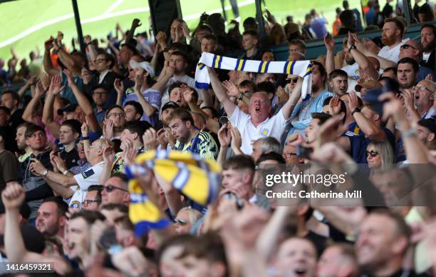 Fans of Leeds United celebrate after their sides victory of the Premier League match between Leeds United and Chelsea FC at Elland Road on August 21,...