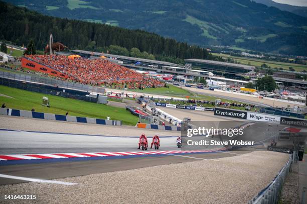 MotoGP field in front of the crowd during the race of the CryptoDATA MotoGP of Austria at Red Bull Ring on August 21, 2022 in Spielberg, Austria.