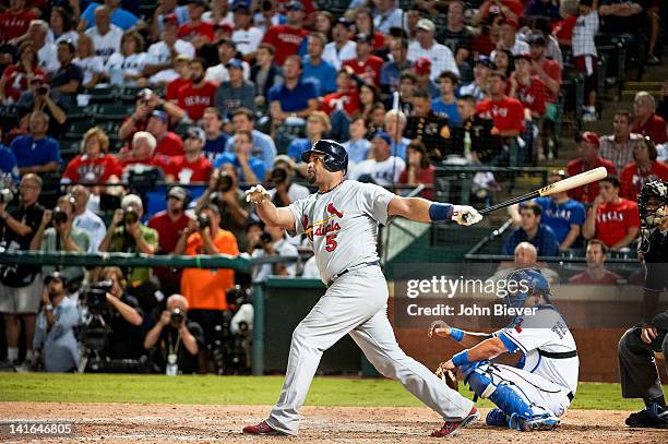 World Series: St. Louis Cardinals Albert Pujols in action, hitting home run vs Texas Rangers at Rangers Ballpark. Game 3. Pujols's third HR of the...