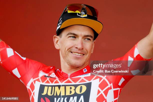 Edoardo Affini of Italy and Team Jumbo - Visma celebrates winning the Red Leader Jersey on the podium ceremony after the 77th Tour of Spain 2022,...