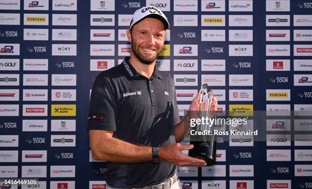 Maximilian Kieffer of Germany with the trophy after winning the D+D Real Czech Masters at Albatross Golf Resort on August 21, 2022 in Prague, Czech...