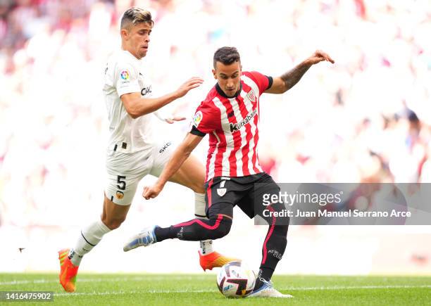 Alejandro Berenguer Remiro of Athletic Club is put under pressure by Gabriel Paulista of Valencia CF during the LaLiga Santander match between...