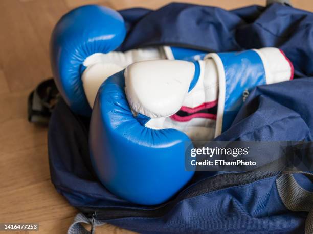 boxing gloves - gym bag stock-fotos und bilder
