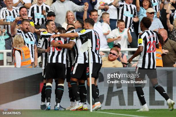 Miguel Almiron of Newcastle United celebrates after scoring their team's first goal during the Premier League match between Newcastle United and...
