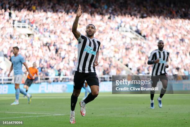 Callum Wilson of Newcastle United celebrates scoring their side's second goal during the Premier League match between Newcastle United and Manchester...