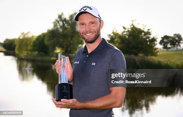 Maximilian Kieffer of Germany with the trophy after winning the D+D Real Czech Masters at Albatross Golf Resort on August 21, 2022 in Prague, Czech...