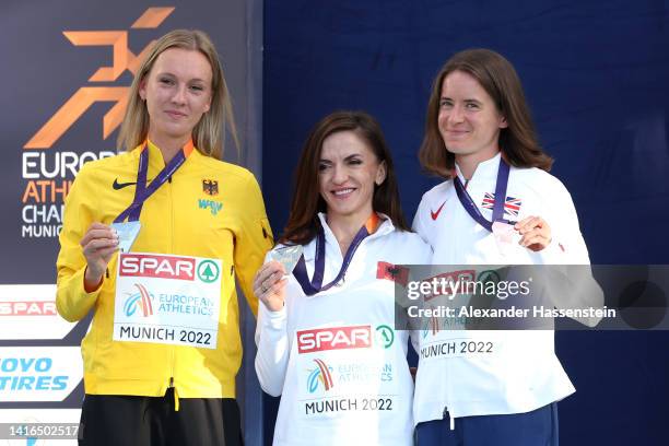 Silver medalist Lea Meyer of Germany, Gold medalist Luiza Gega of Albania and Elizabeth Bird of Great Britain pose on the podium during the Athletics...