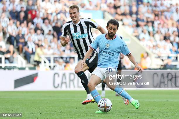 Bernardo Silva of Manchester City scores their side's third goal during the Premier League match between Newcastle United and Manchester City at St....